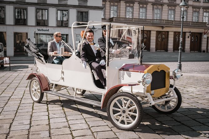 City Sightseeing Tour in an Electro Vintage Car (up to 5 people) - Covered Comfort, Warm Blankets, and Why Rain Days Can Be a Win