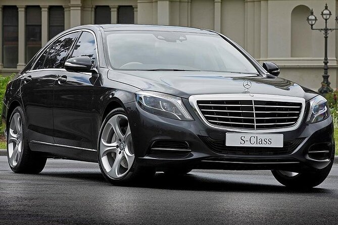 CO2-Offset Arrival from Salzburg Airport to Salzburg by Car/Van - Your Chauffeur and the Mercedes Ride: Comfort That Feels Worth It