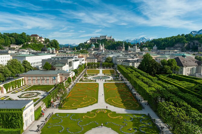 From Vienna: Hallstatt, Salzburg, Melk, Alps & Lakes Day Trip - Salzkammergut Mountains Drive: The Scenic Middle Between Big Towns