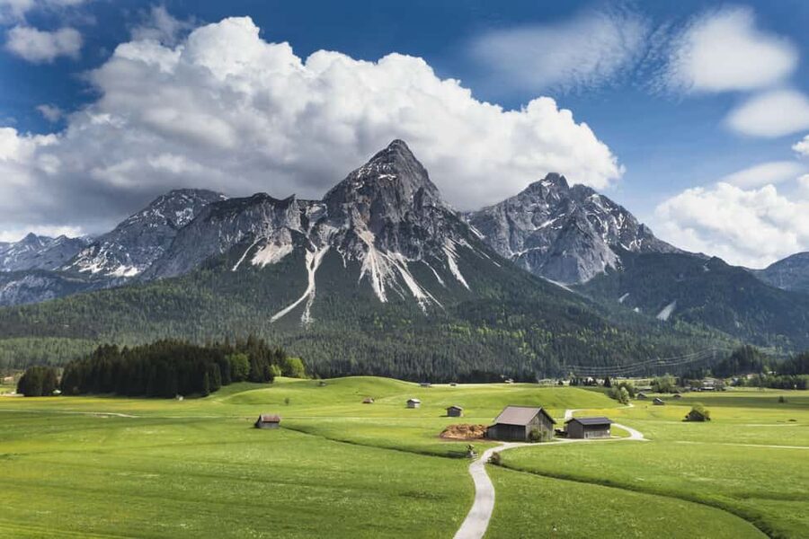 From Vienna: Mountains, Hallsttat & Salzburg Guided Day Tour - Guides, photos, and small-group energy that keeps you from feeling rushed