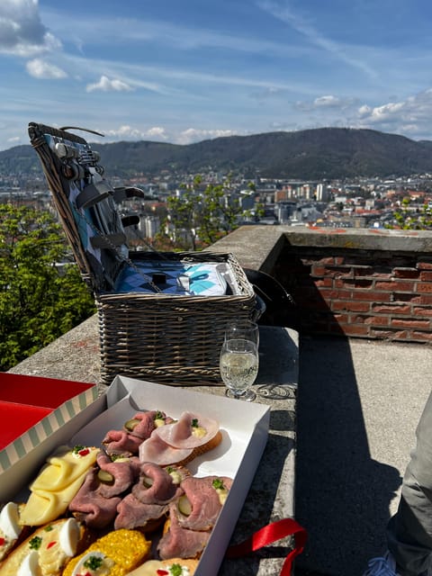 Graz: Funicular Ride & Schlossberg Picnic Experience - The Schlossberg Walk: Tunnels, Secret Paths, and Photo-Focused Stops