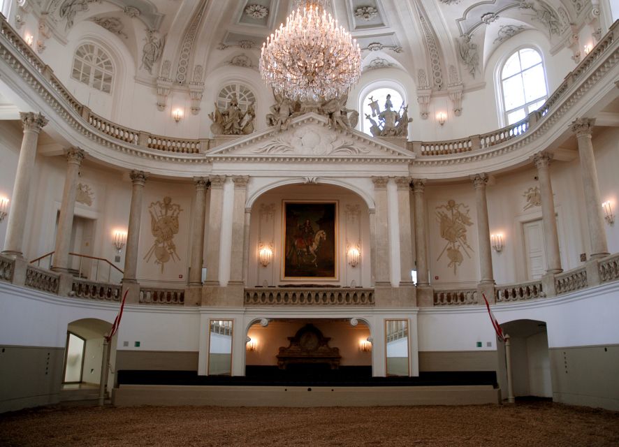 Performance Of The Lipizzans At Spanish Riding School - The baroque Winter Riding School at Hofburg, where the show actually happens