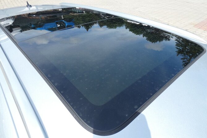 Private Airport and City Transfer in Panoramic Roof Station Wagon - Price and what you truly get for your money