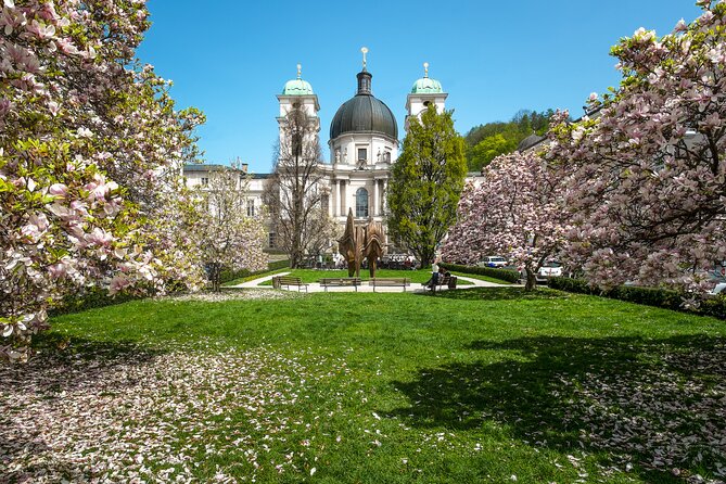 Salzburg On the Traces of Mozart Private Tour - Passing the pond toward the festival halls and Salzburg’s performance venues