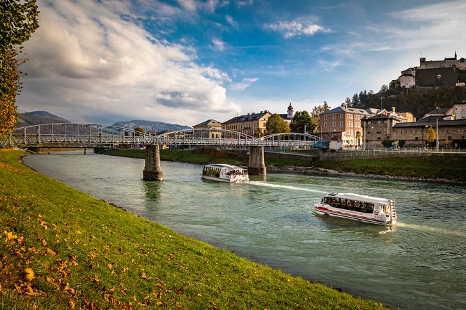 Salzburg Panorama Cruise on the Salzach river - Seating, warmth, and photo strategy on a mostly-covered boat