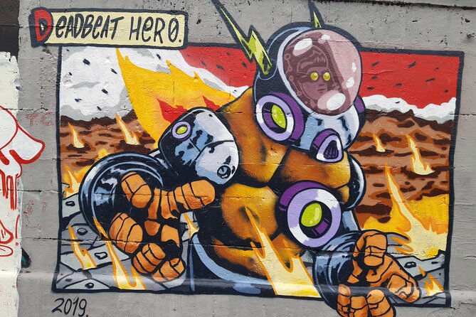 Street Art Tour in Vienna - Stop 1: District Heating Plant Spittelau and the chimney backdrop