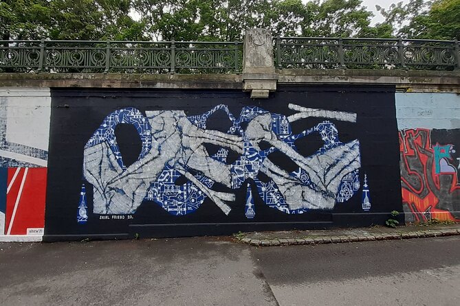 Street Art Tour in Vienna - Stop 4: Friedensbrücke, TS90 crew pieces and Manuel Muriel’s octopus