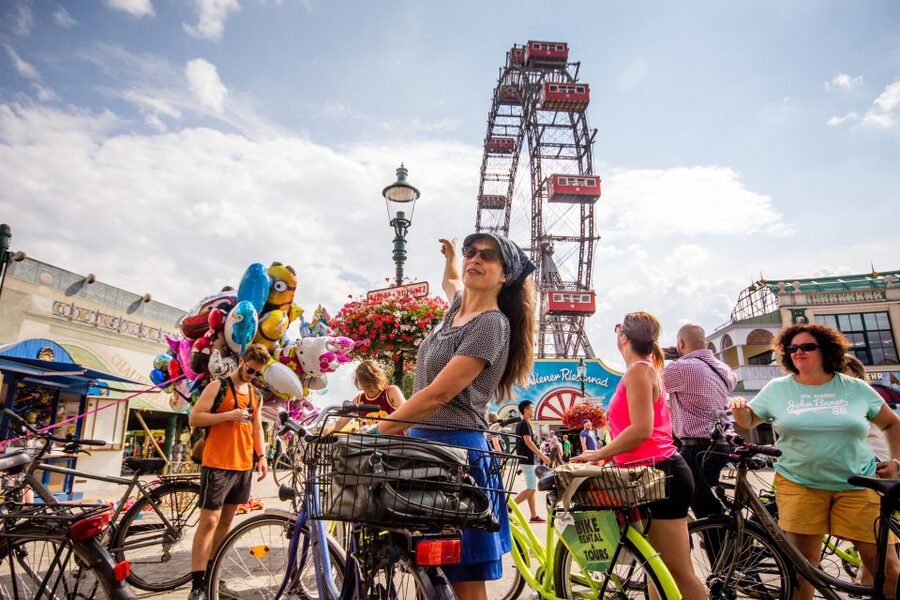 Vienna by Bike 3-Hour All-In-One City Bike Tour in English - Karlskirche domes on Karlsplatz, then Prater Park and the Ferris wheel payoff