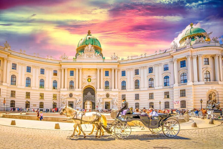 Vienna: Christmas Photoshoot with a Pro Photographer - Ankeruhr stop: using tiny details for memorable photos