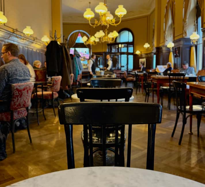 Vienna: Guided Food Tour with 8+ Food Tasting & Secret Dish - Schnapps in a historic shop, plus the secret dish moment