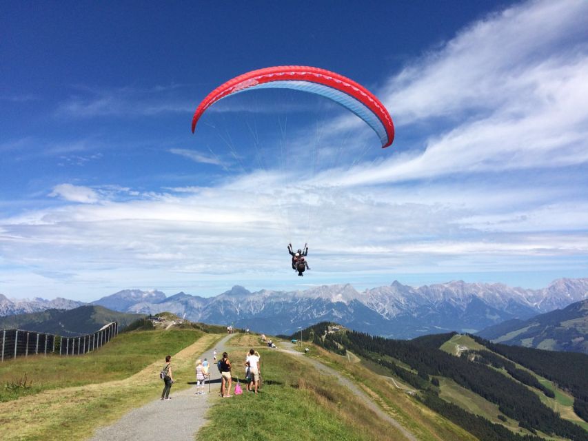 Zell am See: Schmittenhöhe Tandem Paragliding Flight - Meeting point, shuttle bus, and the cable car reality check